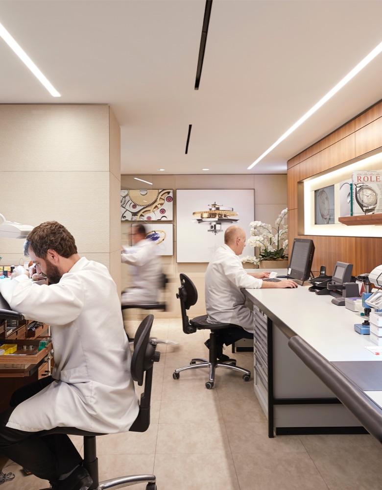 A team of people servicing Rolex watches